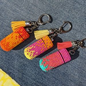 Beaded portable pillcase keychain/zipper/ bag charms in cute ombre.